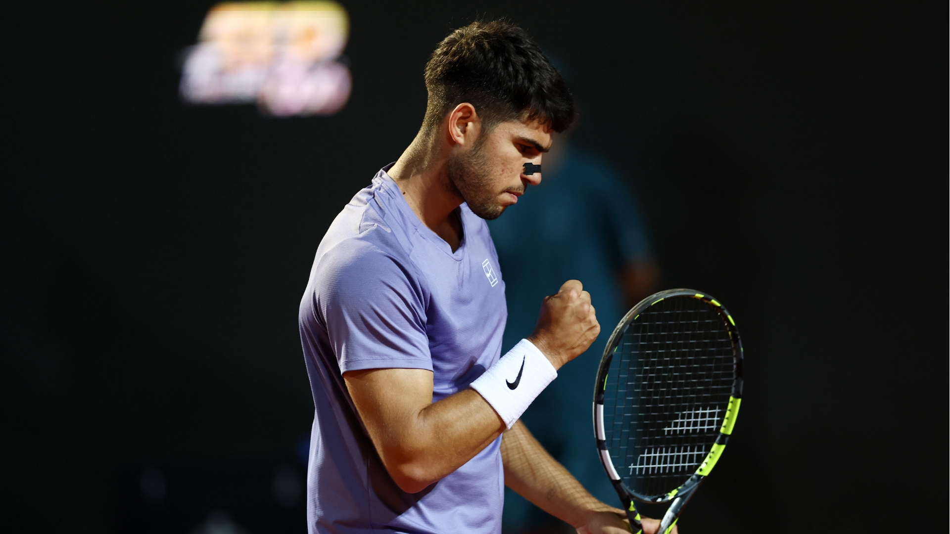 Carlos Alcaraz e Jannik Sinner celebrando vitórias no Roma Open