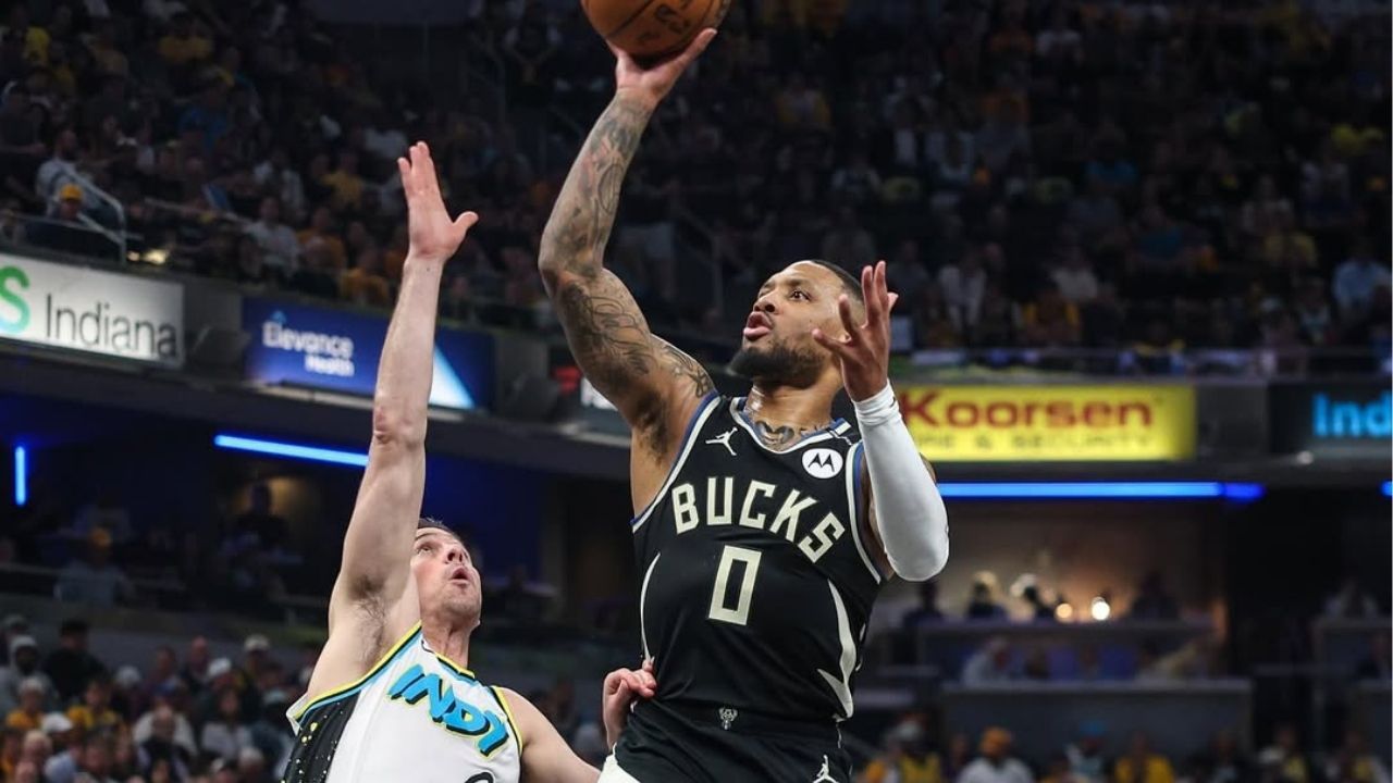 Damian Lillard sendo carregado após lesão no tendão de Aquiles