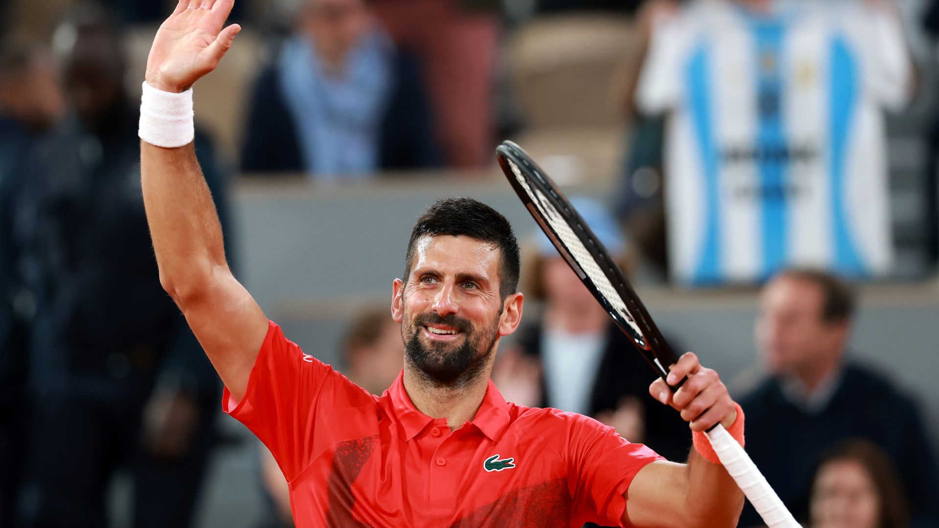 news.img_alt Novak Djokovic em ação durante Roland Garros
