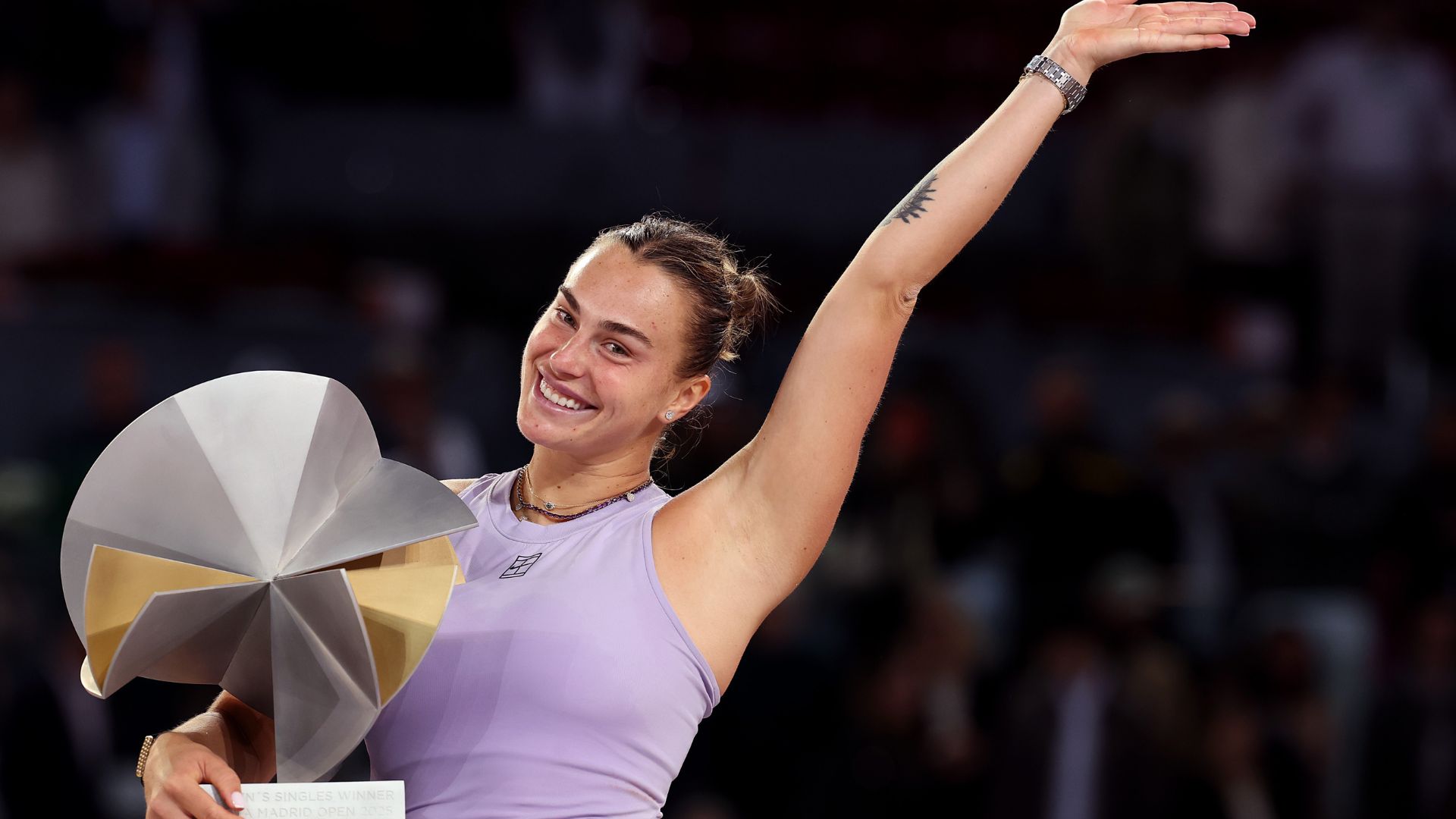 Aryna Sabalenka comemorando vitória e expressando amor pelos brasileiros na final